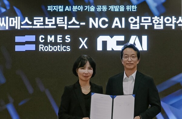 NC AI and CMES Robotics have agreed to collaborate on physical AI research and development and technology sharing. NC AI CEO Lee Yeon-soo (left) and CMES Robotics CEO Lee Sung-ho pose for a commemorative photo after signing the agreement. (Photo: NC AI)